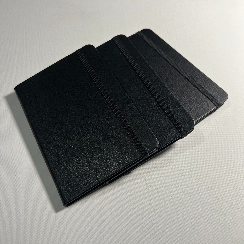 3 Black leather notebooks with blank pages
